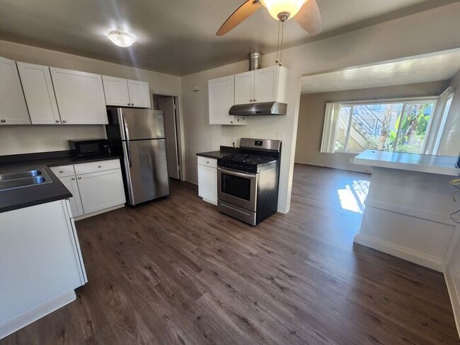 Photo - Spacious 2BR Duplex For Rent with a private patio/yard. Close to Sail Bay