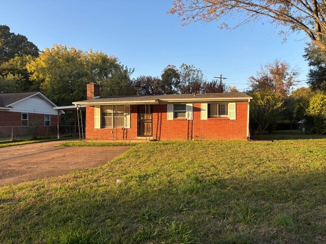 Building Photo - 3 bedroom, 1 bath with covered carport parking
