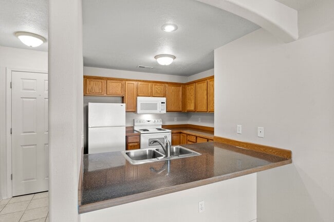 Photo - Upstairs 1-bedroom, 1-bath Apartment in an... Unit 247