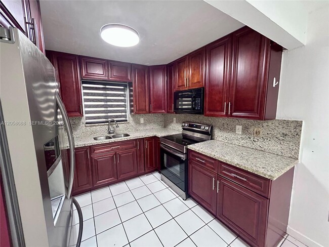 Building Photo - 2925 W 80th St Unit 109