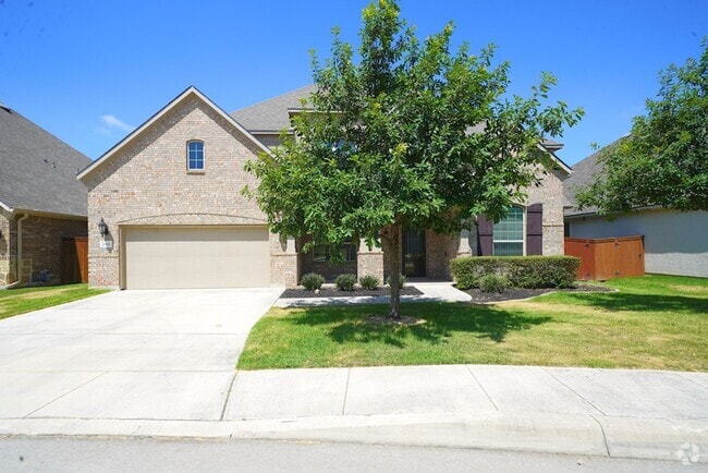 Building Photo - Executive Style Rental Now Available in Bo...