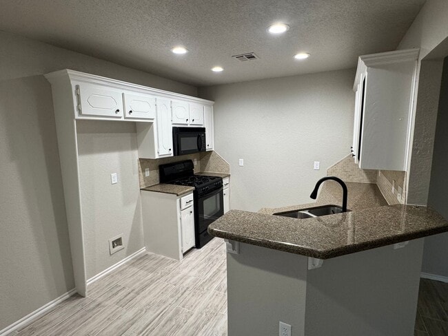 Photo - Storm Shelter!!! This 3 bed, 2 bath, 2 Car Garage home has new paint, kitchen and bathroom granit...