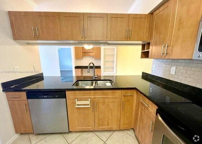 Building Photo - 6418 Emerald Dunes Dr Unit 301 Rental