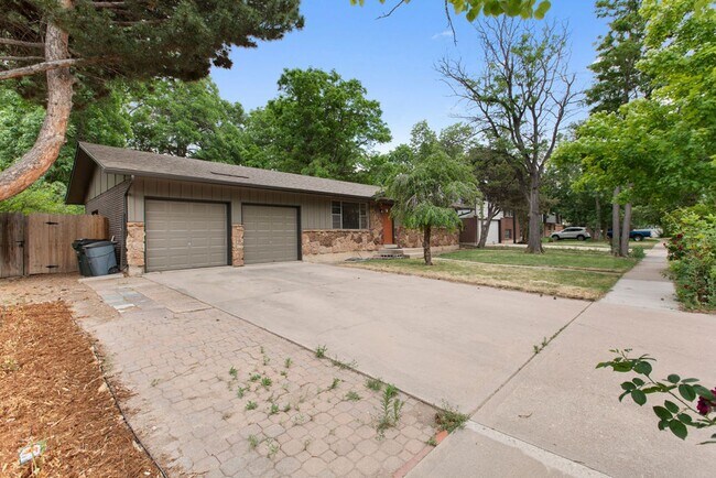 Photo - Student Friendly! Spacious 5 Bedroom, 2 Bath Home with Finished Basement and Attached Garage