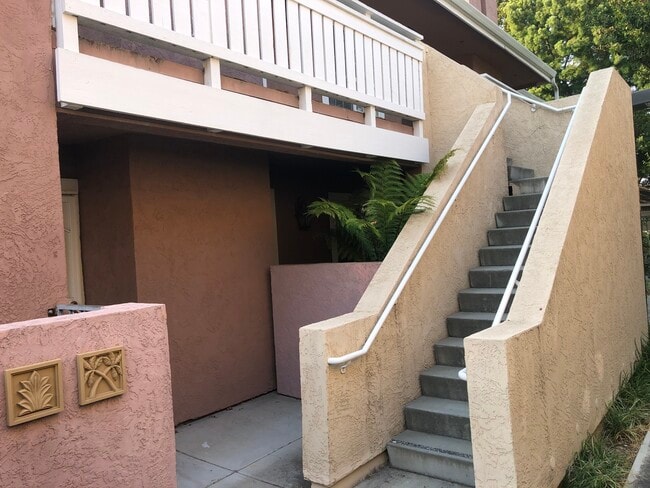 Staircase to unit - 631 E El Camino Real Unit 203