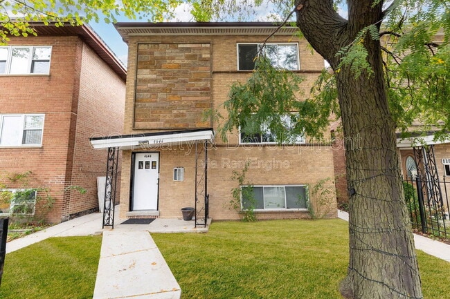 Building Photo - 4644 W 47th St Unit 1