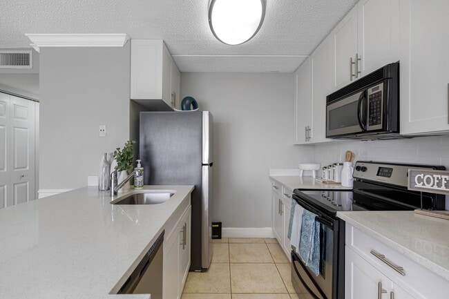 Photo - Palm Court at Wellington Apartments