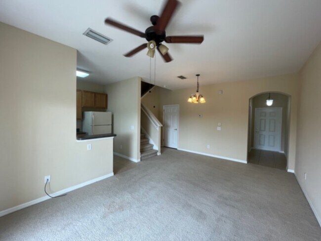 Photo - Spacious Gated Townhouse with Garage, Community Pool, and More!