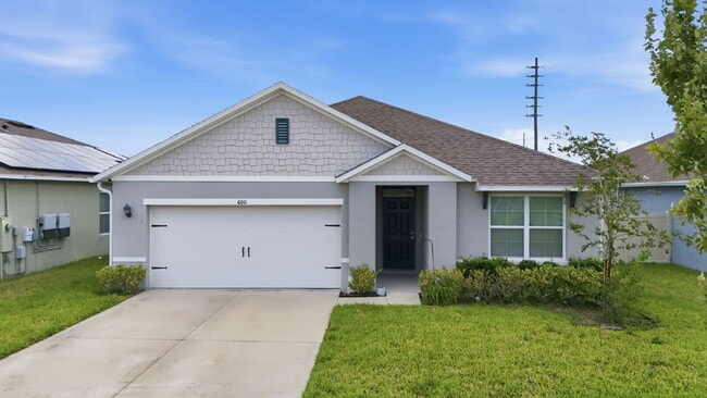 Building Photo - Three Bedroom, 2 Bathroom single family home with 2 Car Garage.