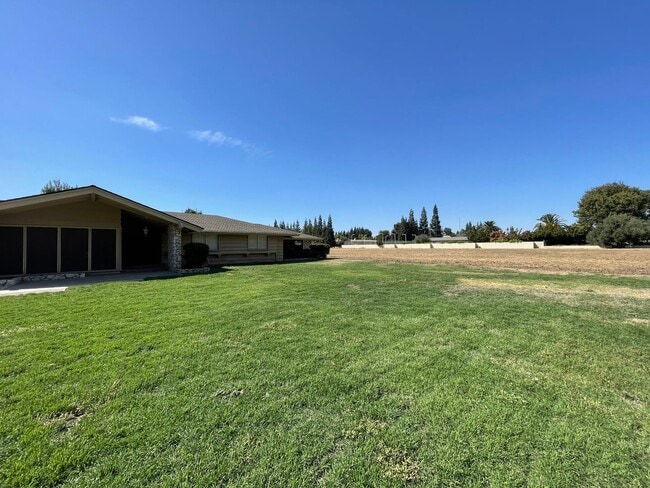 Photo - Custom home located next to Oakdale Country Club!