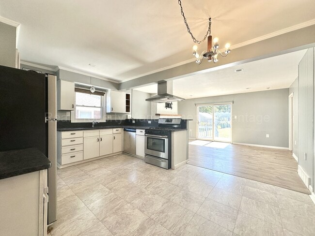 Photo - Spacious 4-Bedroom, 2-Bath Home in Clawson – Minutes from Downtown!