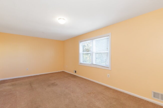 Photo - Spacious end-unit three-level townhome fea...