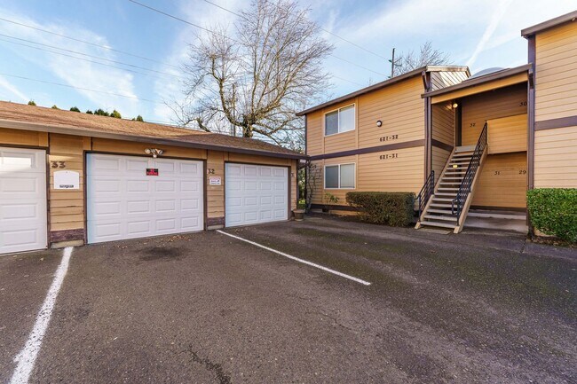 Photo - Updated 1 Bed / 1 Bath Upper-Level Condo with Balcony, Garage & A/C — Gated Community! Unit 32