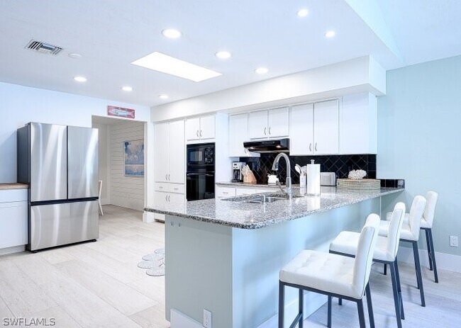 Photo - 760 106th Ave N