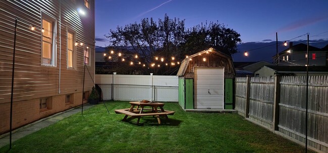 Access to plenty of shared yard space - 53 Sumner St Unit 2