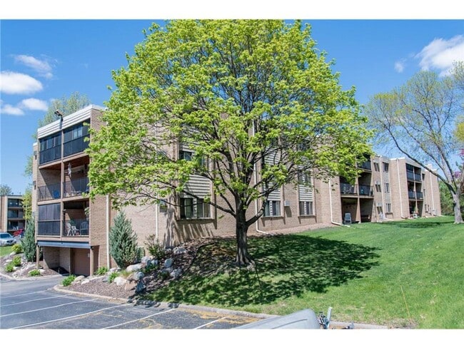 Building Photo - Stylish Eagan Condo w/ Private Balcony, Underground Parking, Updated Kitchen and More!!!