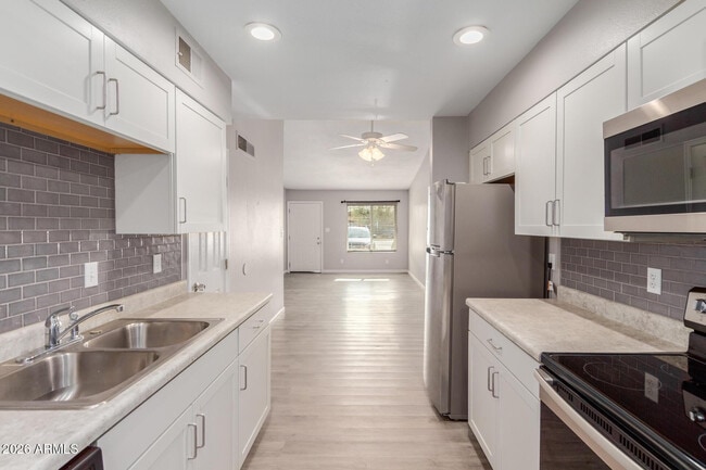 Building Photo - 4530 E Camino Cir Unit Apt 1