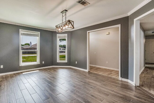 Photo - Welcome to your dream home! This stunning 4-bedroom, 3-bathroom residence is perfectly situated n...