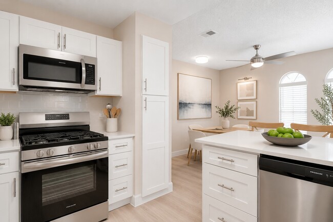 Elevate your culinary experience in this stunning kitchen at Invitational, featuring modern appliances, stylish cabinetry, and open-space design. Ideal for cooking and entertaining, this space blends functionality with elegance. Explore your new home today!