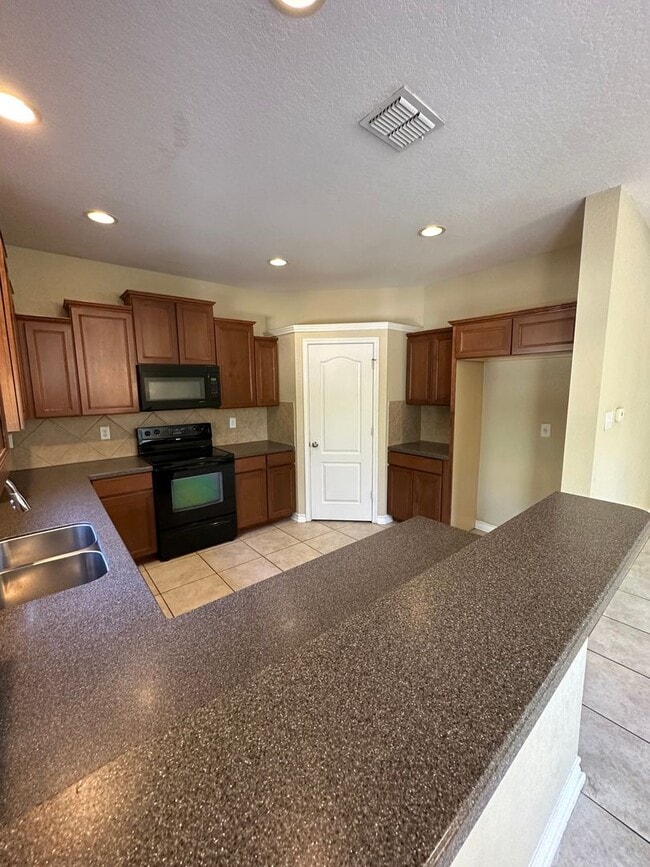 Photo - Beautiful 3 bedroom, 2.5 bath home located in a gated North San Antonio community!