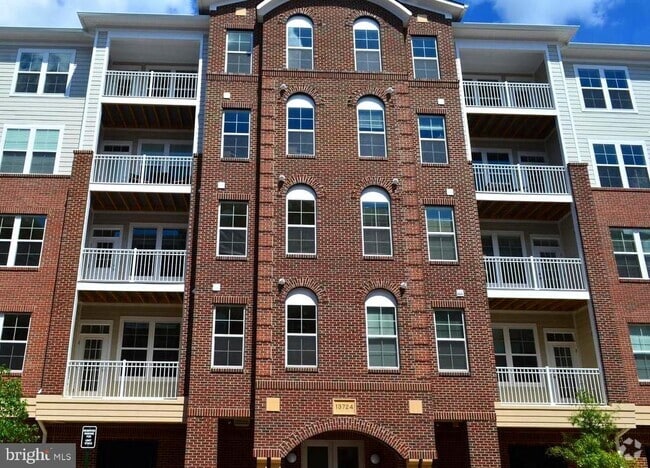 Building Photo - 13724 Neil Armstrong Ave Unit 202 Rental