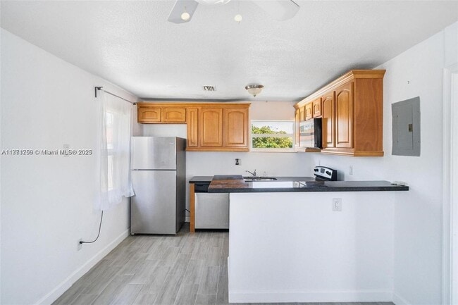 Building Photo - 6221 NW Miami Ct Unit 2-2 Rental