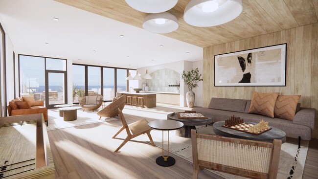 Sky lounge with ocean views, comfortable seating, and outdoor terrace at Modera Revere Beach apartments near Boston. - Modera Revere Beach