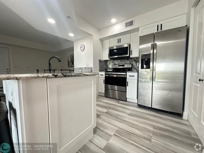 Building Photo - 3744 NW Adriatic Ln Unit 307 Rental