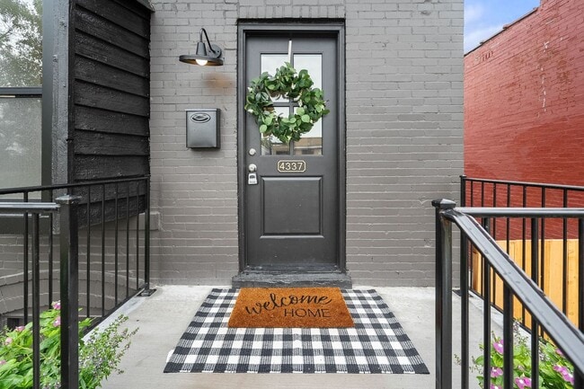 Photo - $1795 - Single Family Home with Private Two-Level Living Spaces, Driveway Parking & Modern Updates