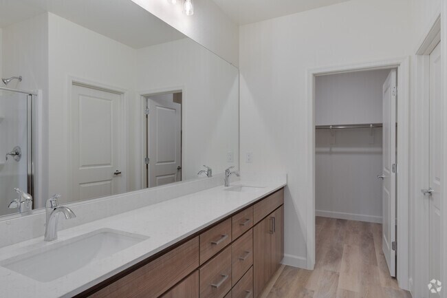 3BR, 2BA - 1,572SF - Primary Bathroom - Woodcrest at Power Ranch Apartments