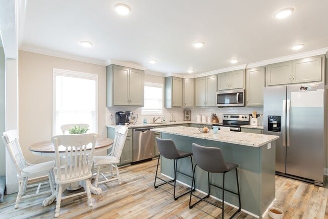 Photo - Contemporary 4BR/2BA Home with 2-Car Garage, Spacious Yard, and Close Proximity to Moody Air Forc...