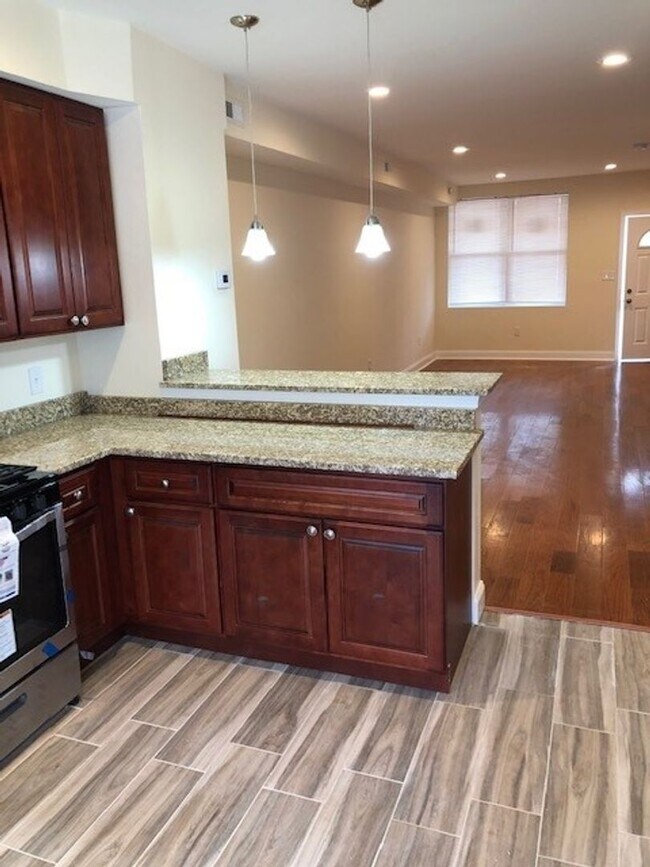 Photo - 2-Bedroom Townhome with Finished Basement ...