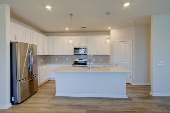 Photo - Spacious 4BR Rental with Stunning Kitchen & Covered Patio