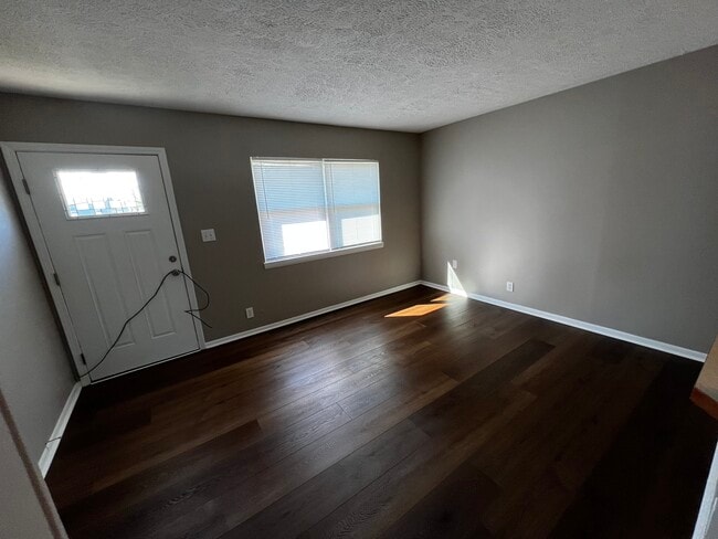 Living Room & Front Door - 5310 E Main St Unit Avondale #4