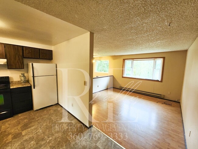 Photo - Spacious Living With Extra Comfort: Bonus Room & Expansive Yard