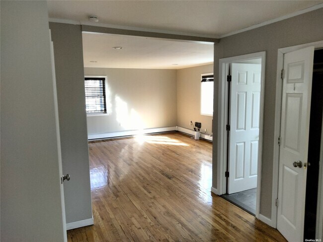 Photo - 77-10 60th St Townhome