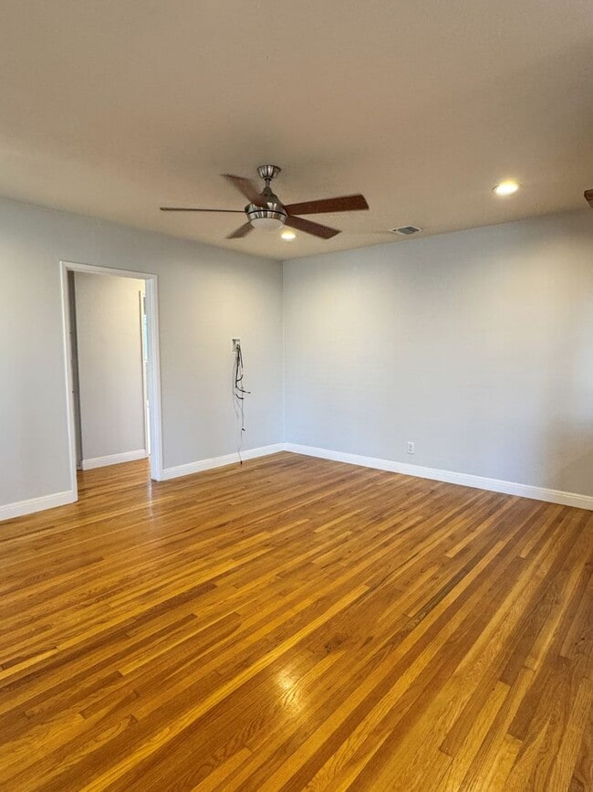 Photo - Charming 2-Bedroom Home with Fireplace, Backyard & Garage in Lakewood