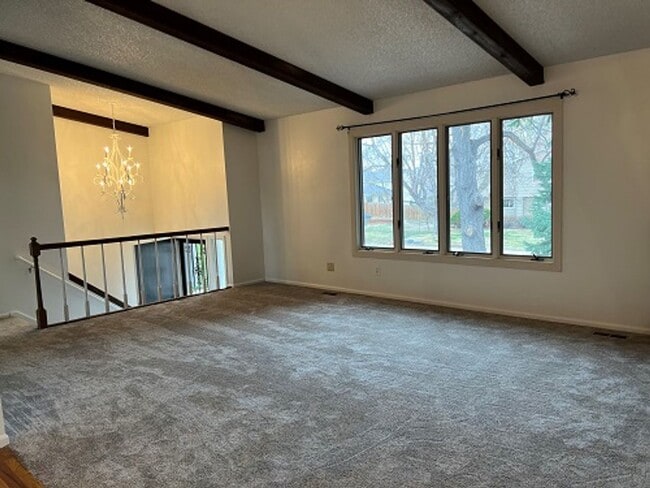 Photo - Vaulted Ceilings, Mountain Views & 3-Car Garage – Prime Fort Collins Rental