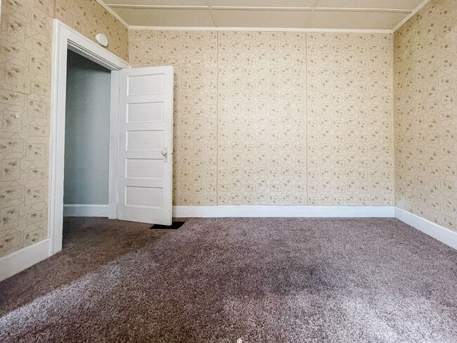 Photo - Attached Garage, Basement, and Shed