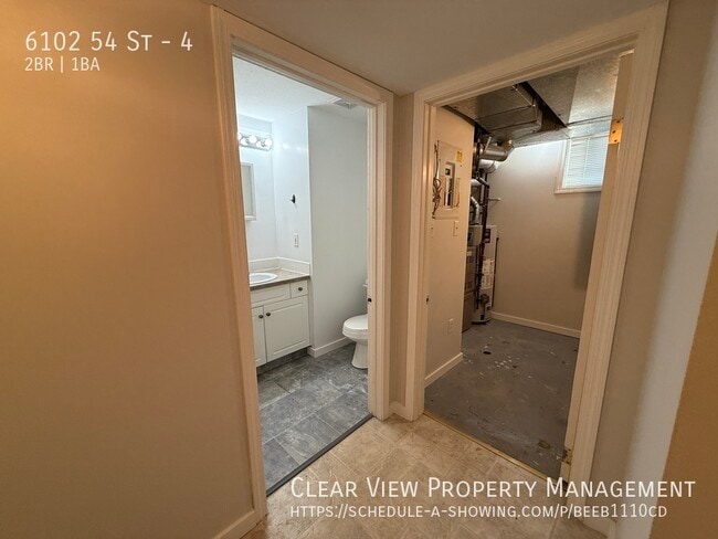 Photo - Recently renovated two-bedroom, one-bathroom suite with UTILITIES INCLUDED in Taber!! Unit 4
