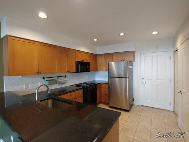 Photo - Top Floor Condo Located in First Hill with 2 Parking Spots Included!!! Unit 504