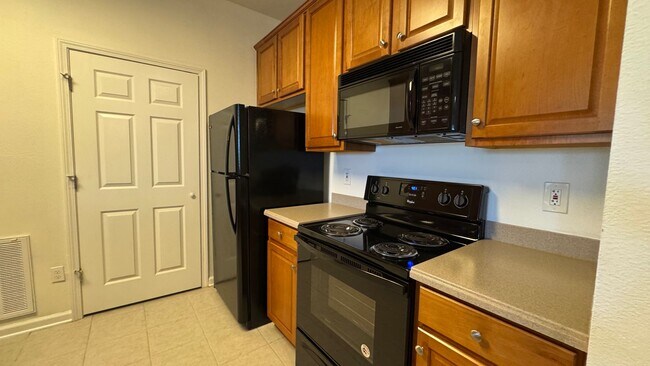 Photo - 2BR 4th Floor Condo Near St. Johns Town Center. Gated Community. Balcony & Elevator Access! Unit 3402