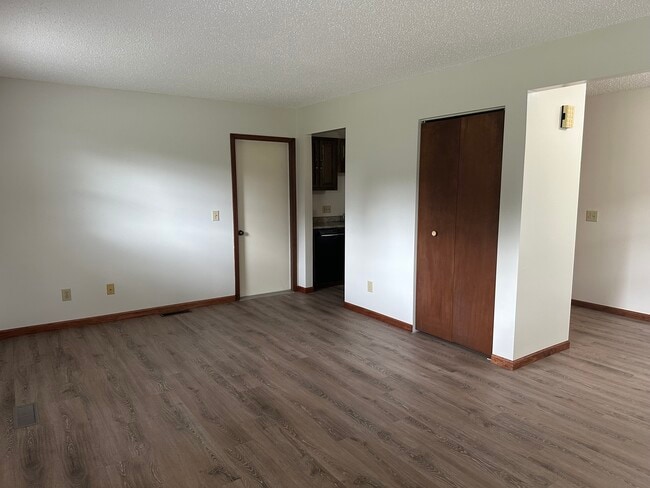 living room - 8794 Manhattan N Unit Apt #1