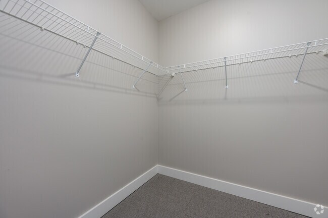 2BR, 2.5BA - 1,561SF - Primary Closet - The Assumption on Blaine Apartments