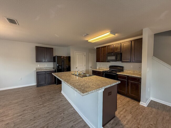 Photo - 4 bedroom, 2.5 bath home centrally located...