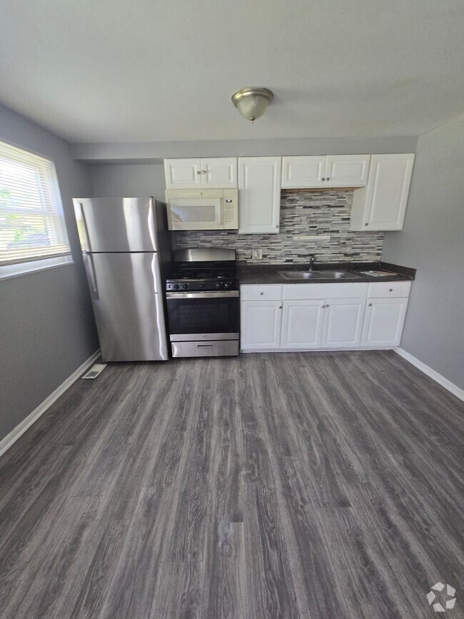 Building Photo - 1610-1612 E 25TH AVE Unit 1610 E 25th Ave Rental