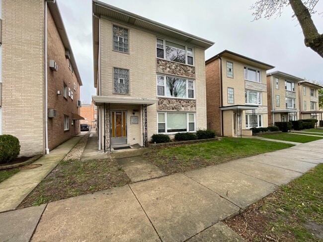 Building Photo - 8645 W Summerdale Ave Unit 3