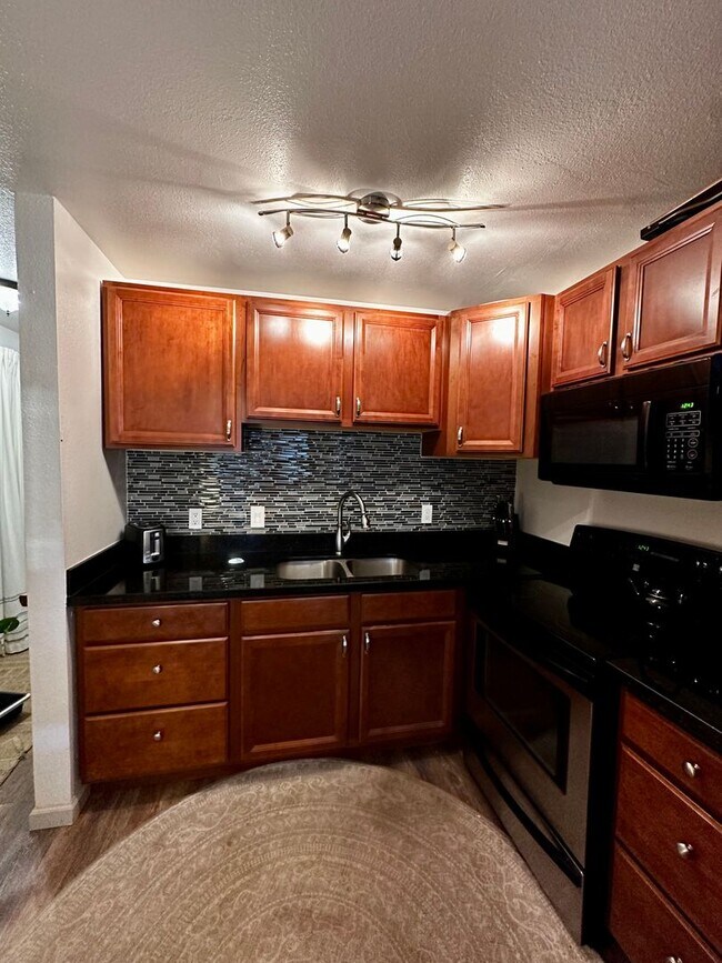 Photo - Maui Lani Terraces ocean view studio, with...