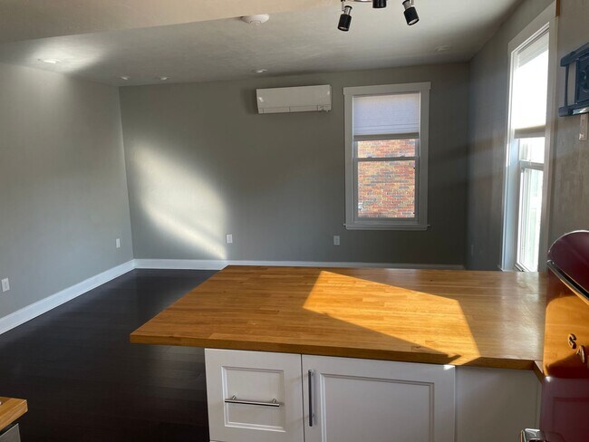 Photo - Two unit building with shared laundry and entryway