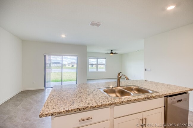 9767 SW Triton Wy